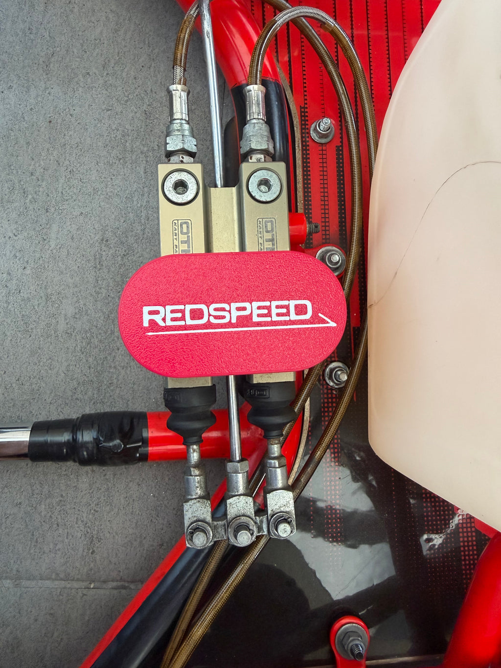 otk master cap brake cylinder with redspeed logo